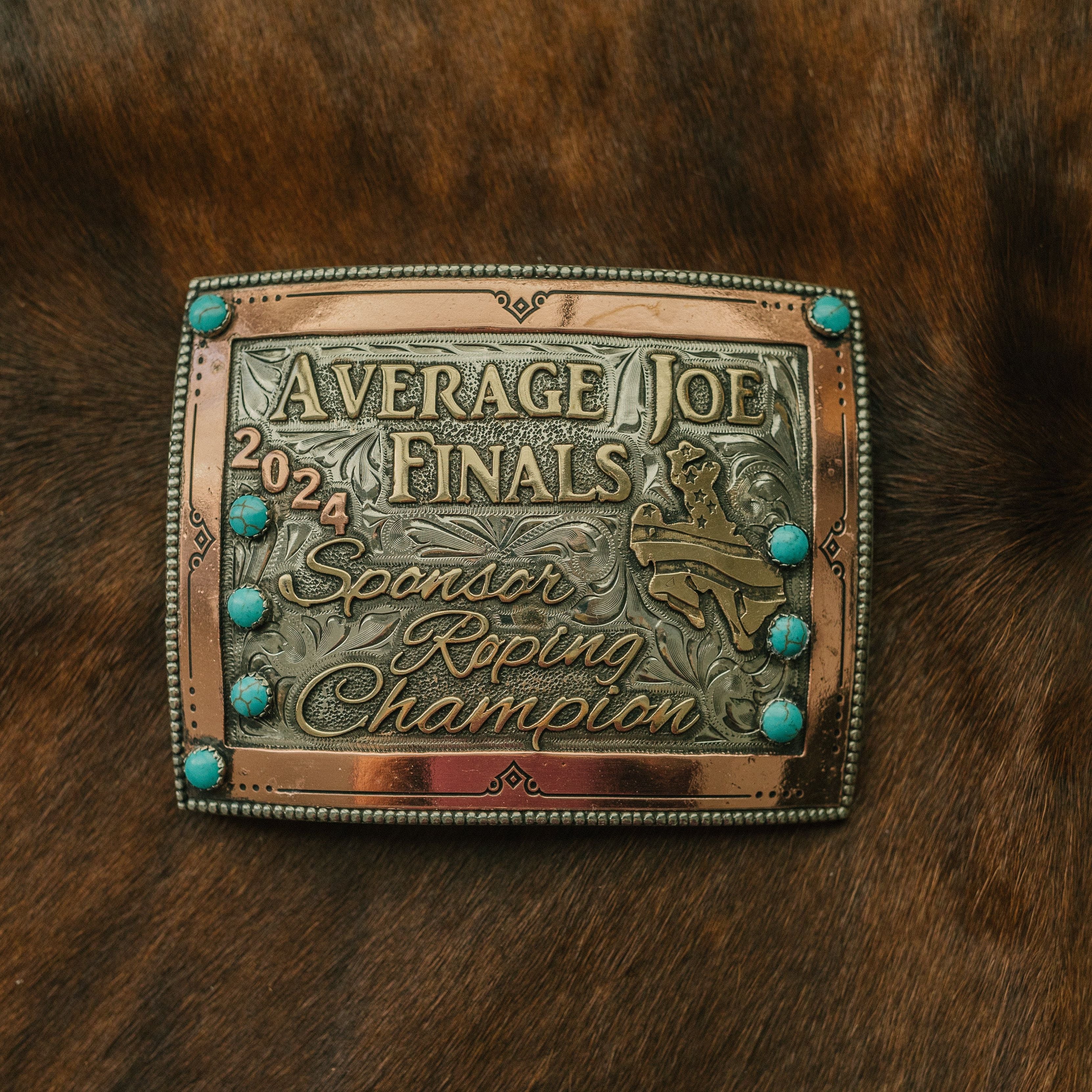 PasoRoblesphotographer-wickenburgaz-customsilver-TheRowdyRose-shelbycaitlinphotography-teamropingawards-headerandheelerbuckles-ropinawards-worldseriesroping
