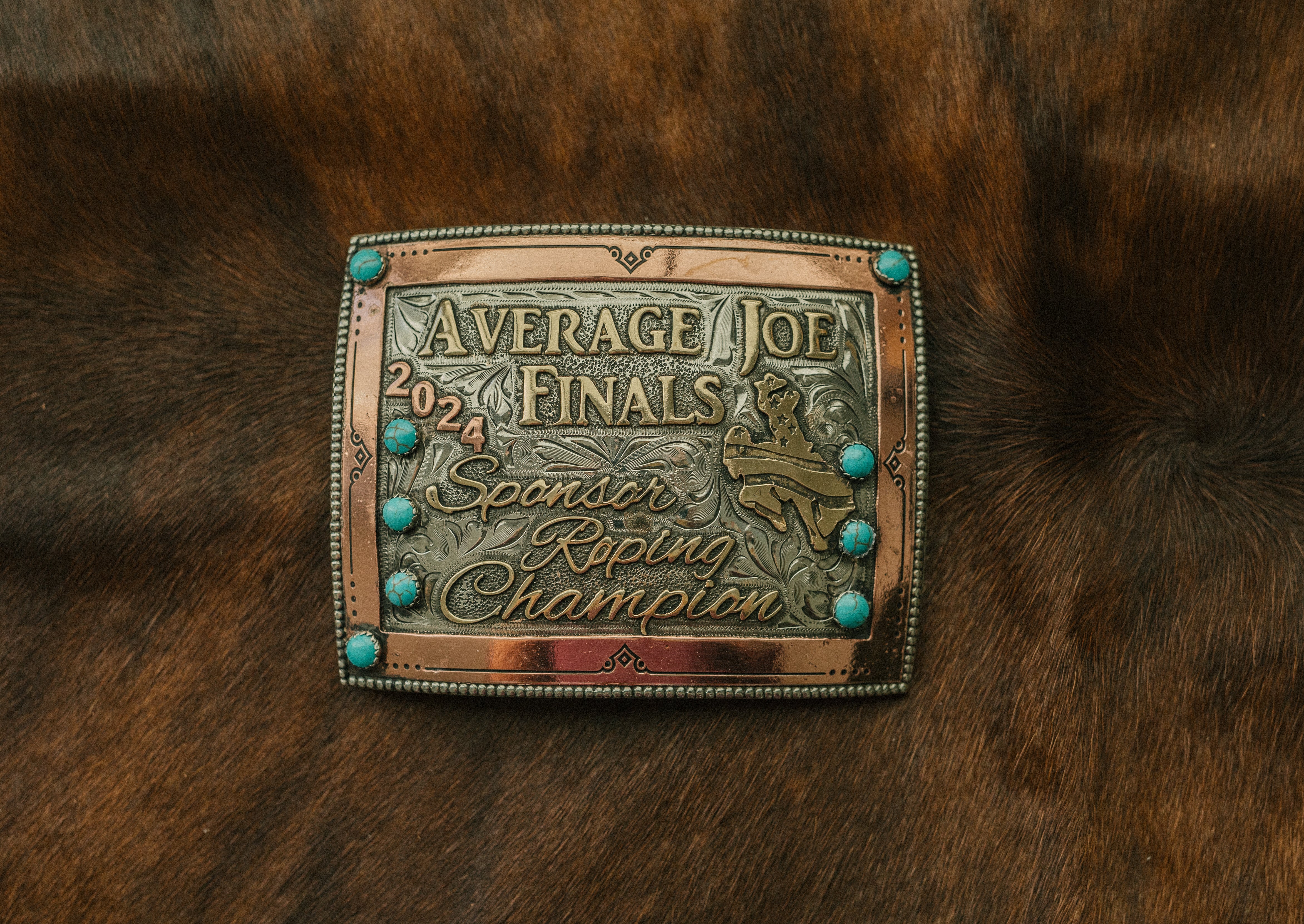 PasoRoblesphotographer-wickenburgaz-customsilver-TheRowdyRose-shelbycaitlinphotography-teamropingawards-headerandheelerbuckles-ropinawards-worldseriesroping